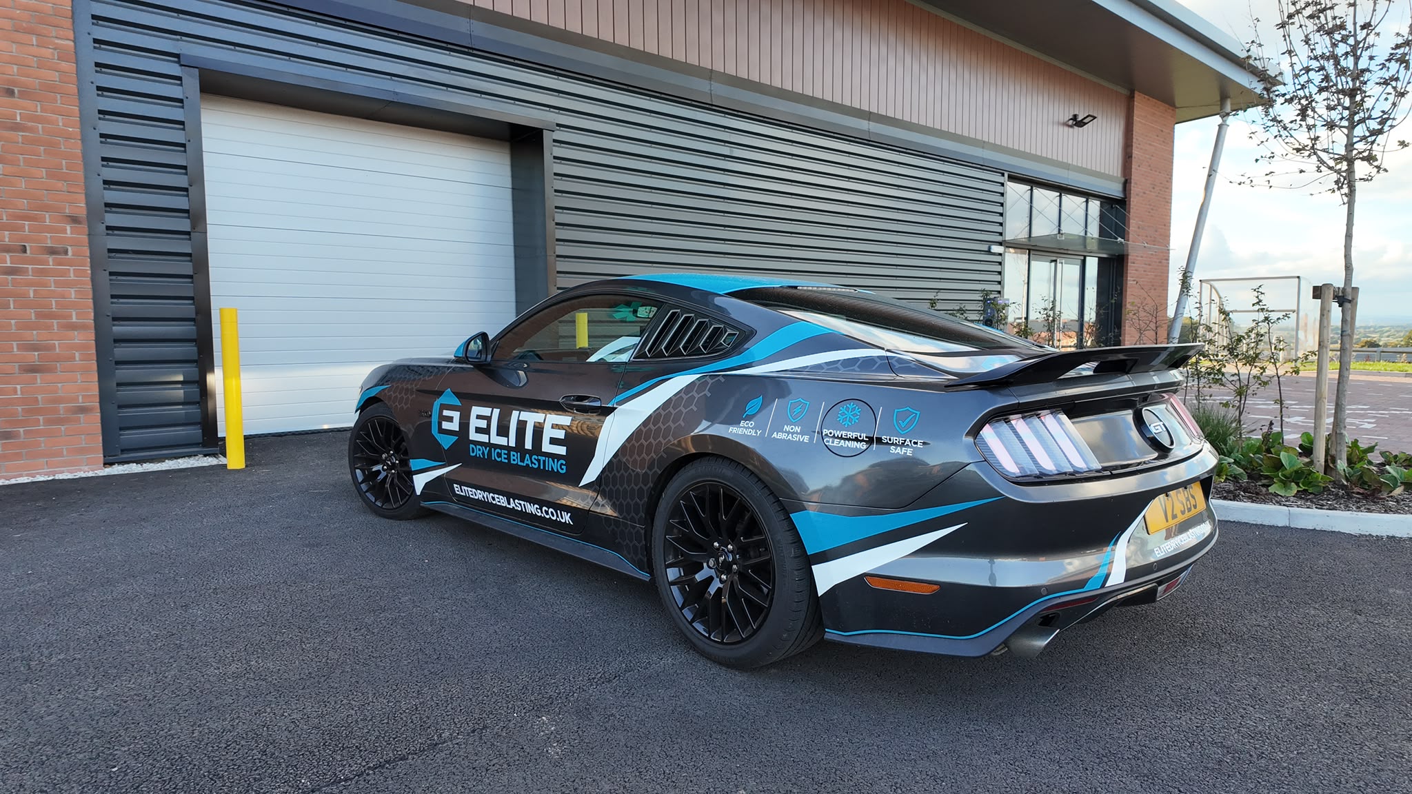 Elite Dry Ice Blasting van showing side branding